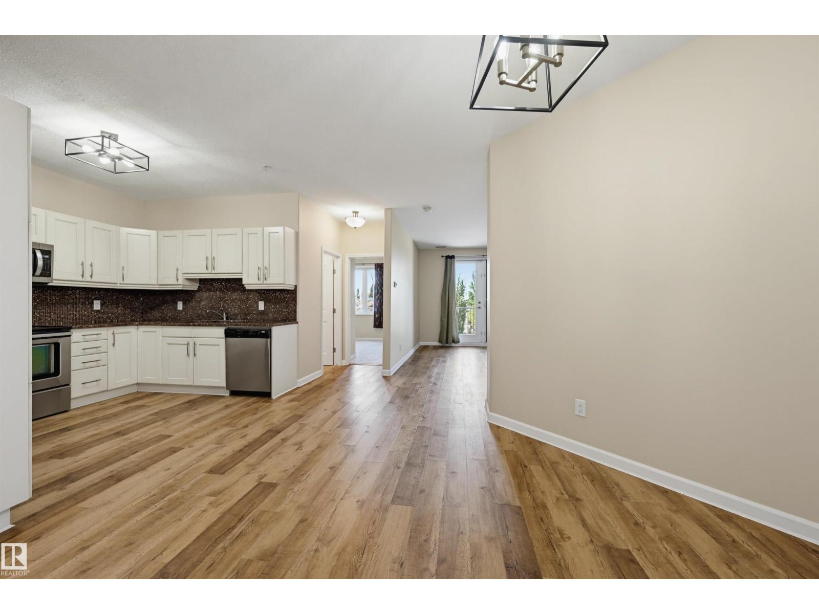 #312 6083 MAYNARD WY NW — photo 8