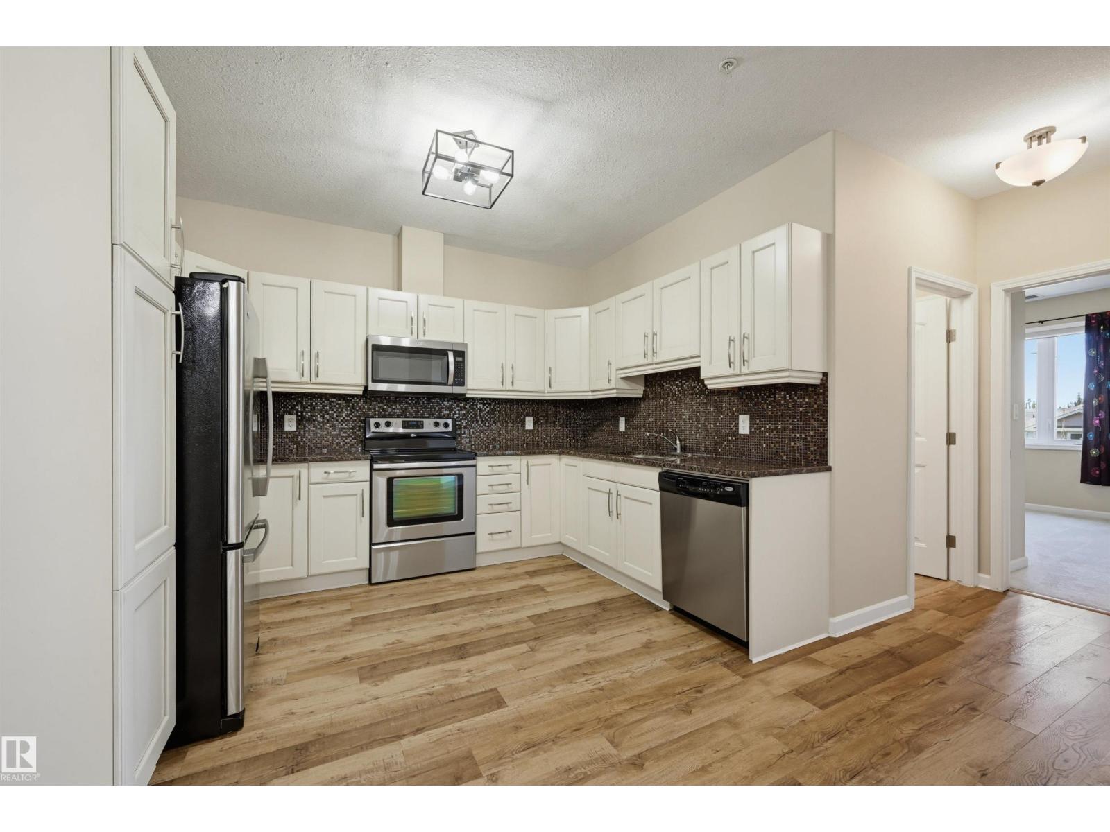 #312 6083 MAYNARD WY NW — photo 9