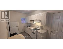 Living room - 17 Howard Park Avenue, Toronto, ON M6R1V3 Photo 11