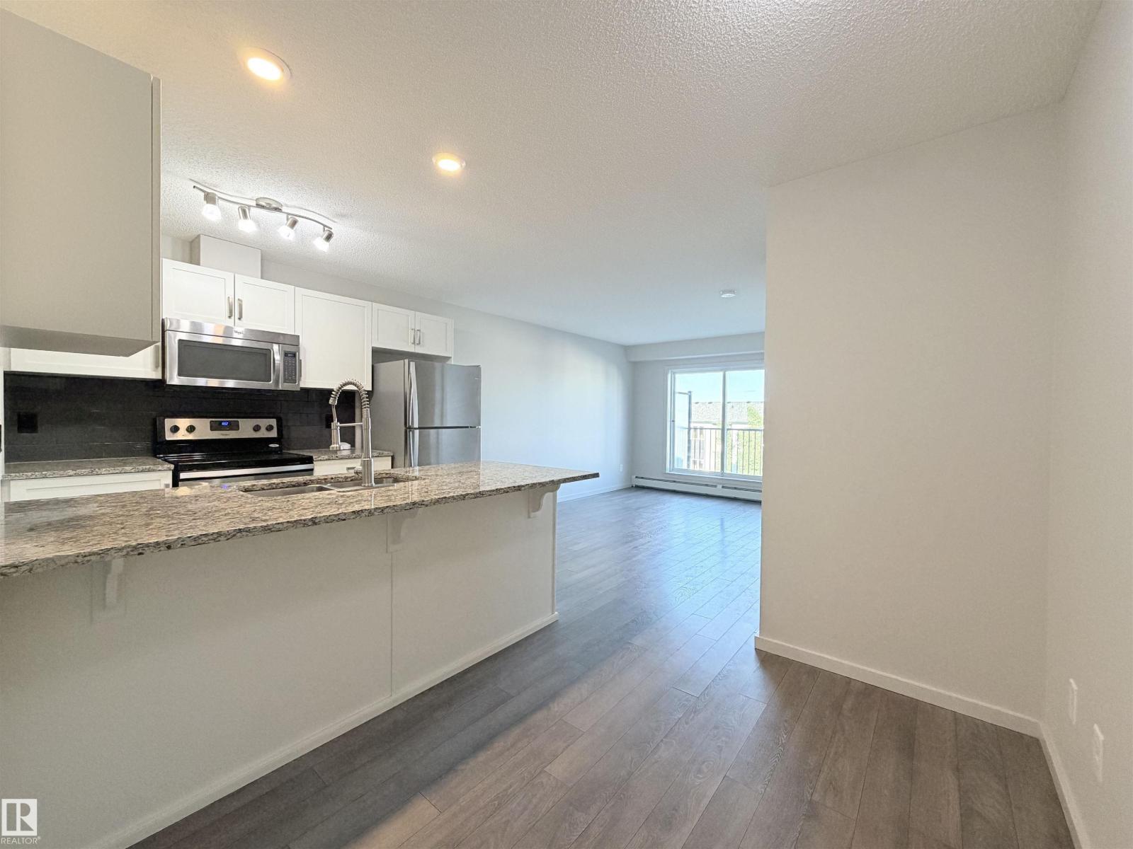 #432 390 Windermere RD NW - 12