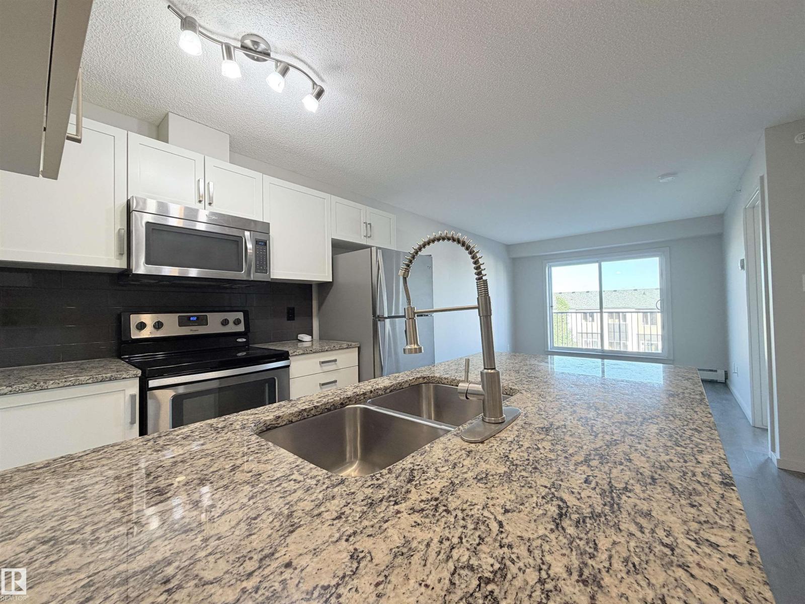 #432 390 Windermere RD NW - 13