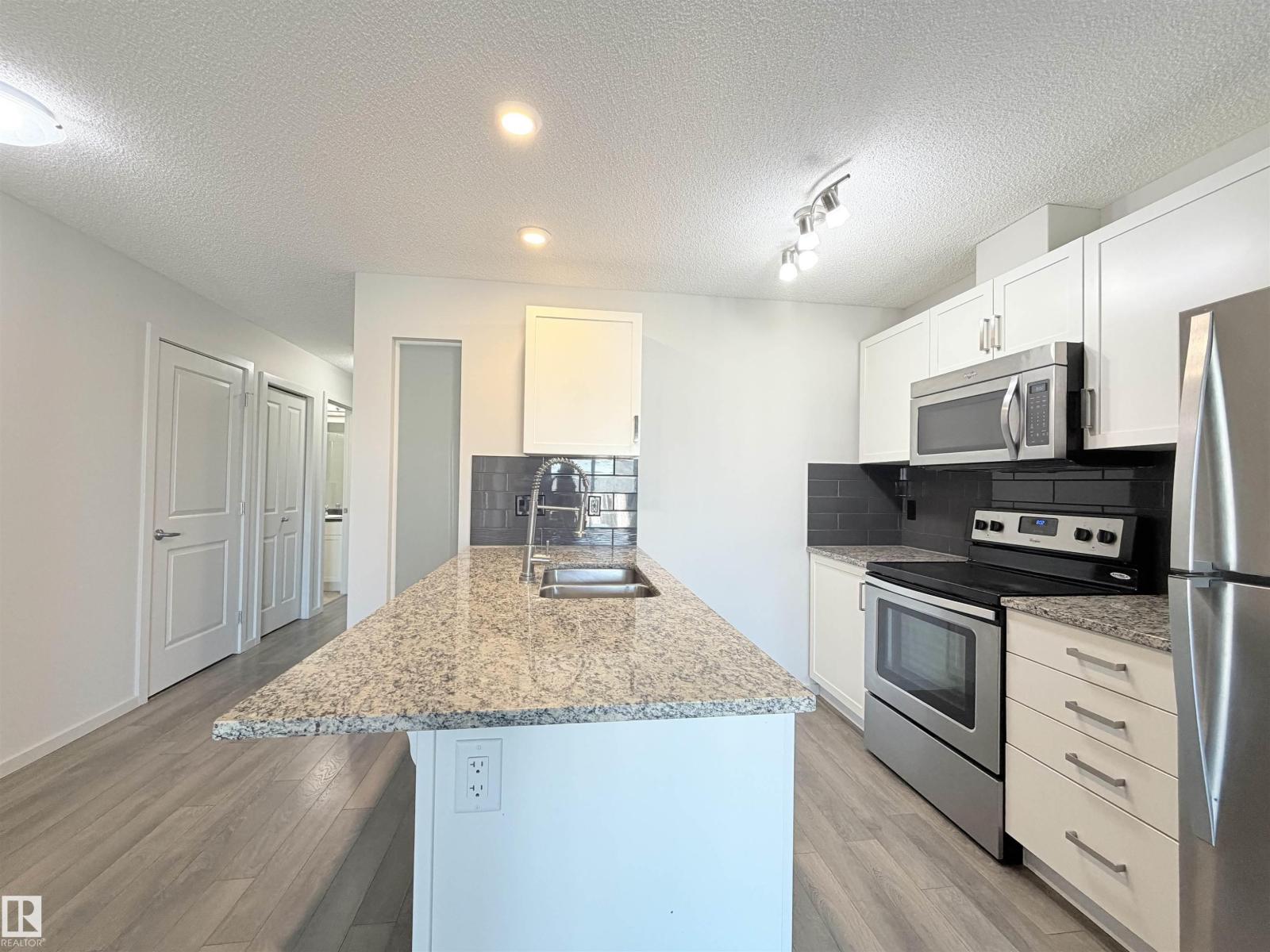 #432 390 Windermere RD NW - 14