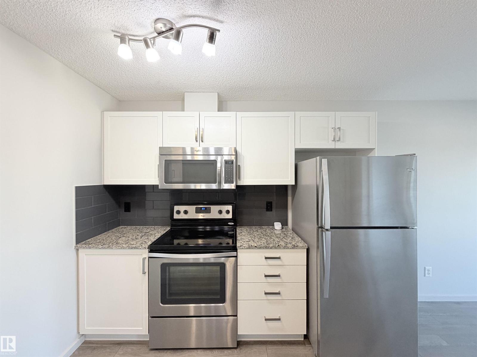 #432 390 Windermere RD NW - 16
