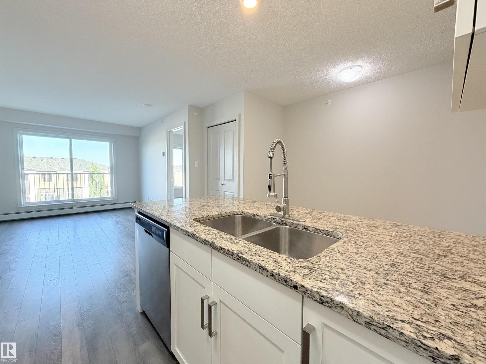 #432 390 Windermere RD NW - 18