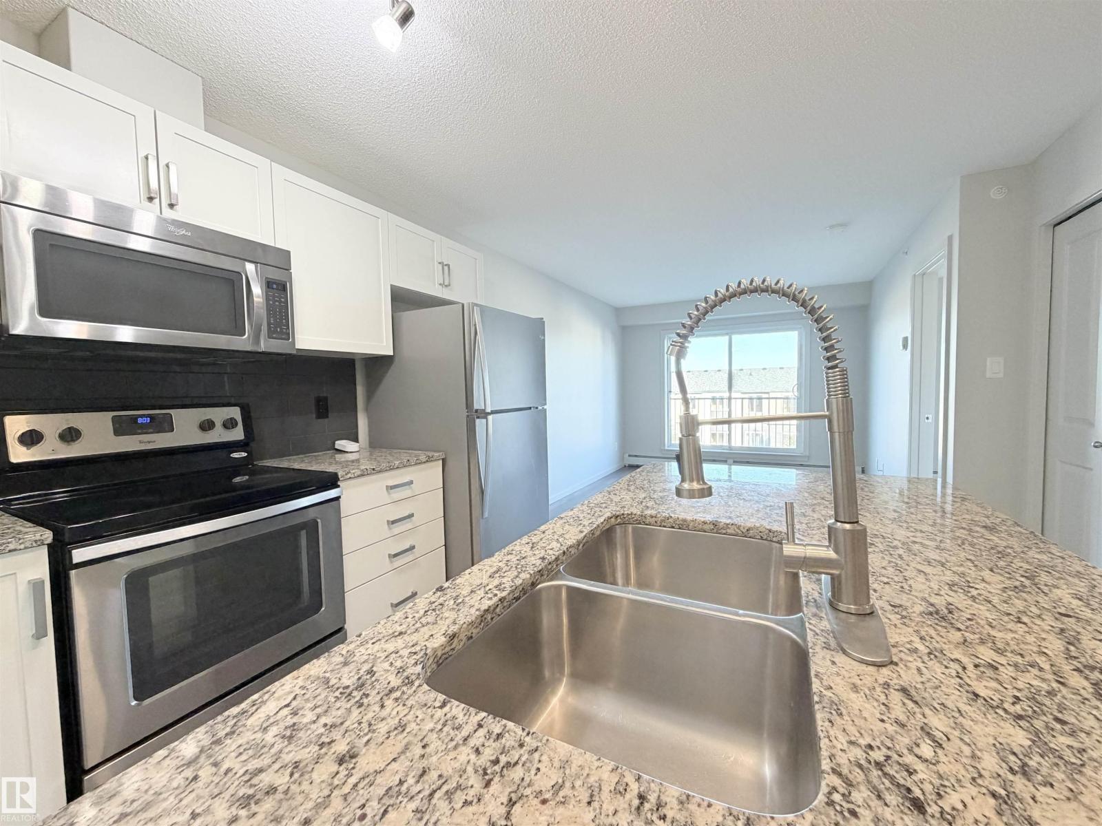 #432 390 Windermere RD NW - 19