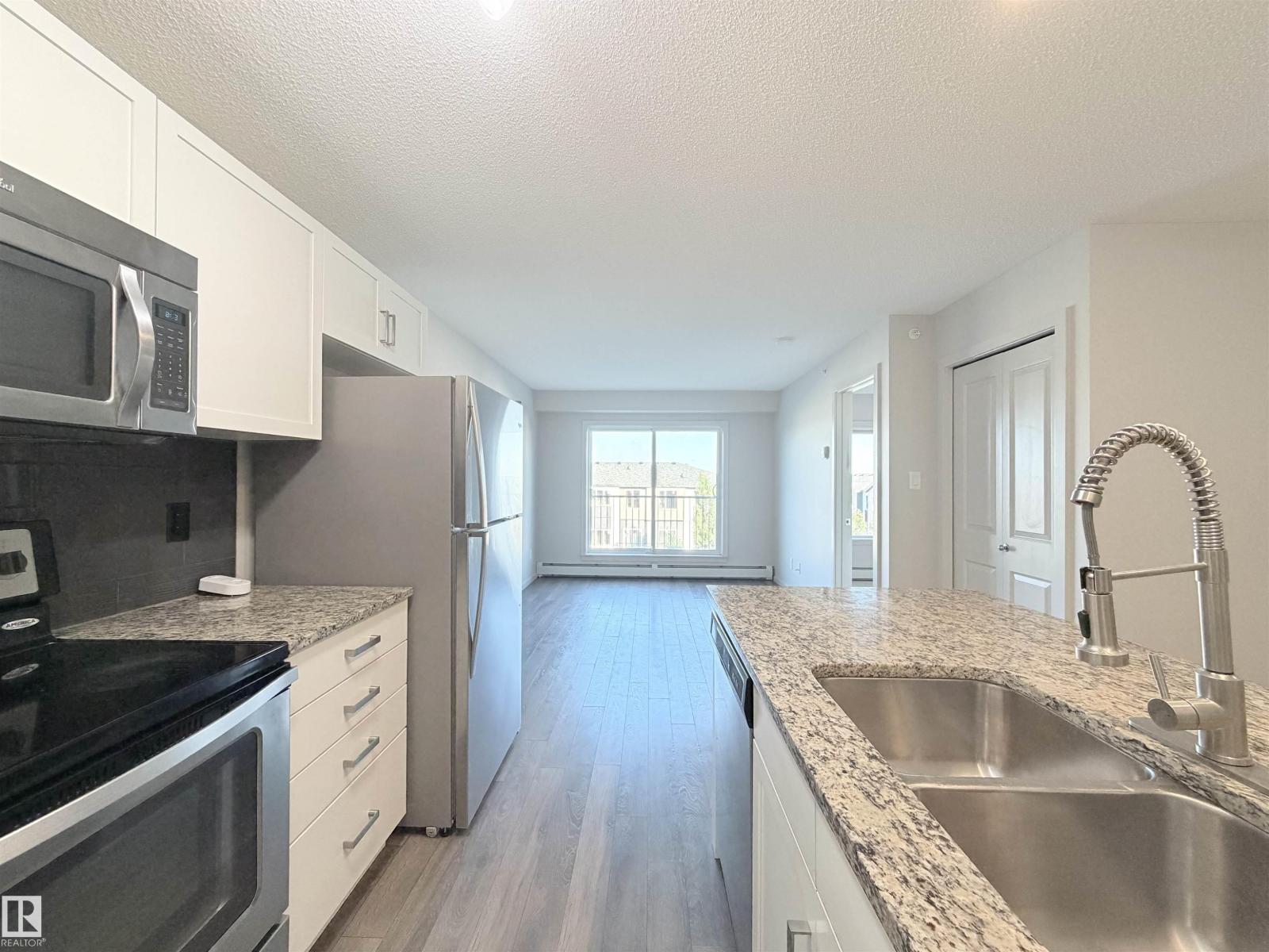 #432 390 Windermere RD NW - 21