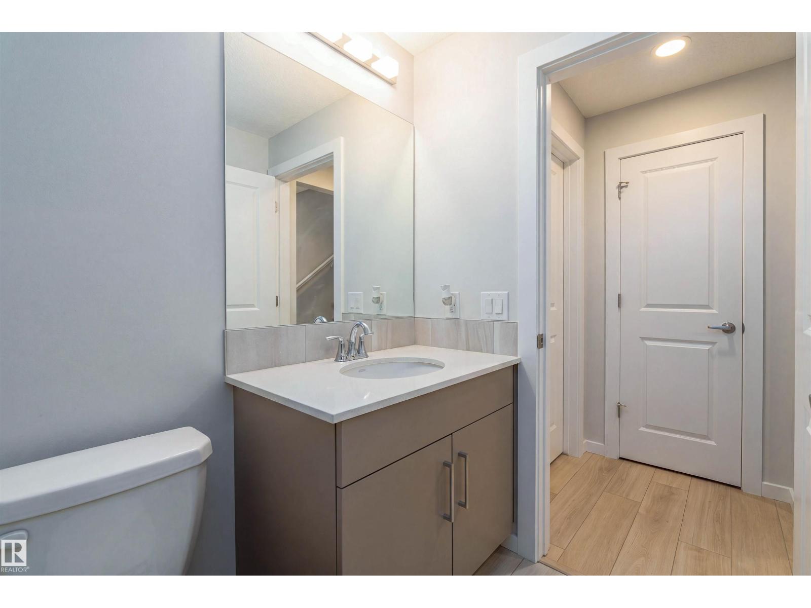 8426 228a ST NW NW - 55