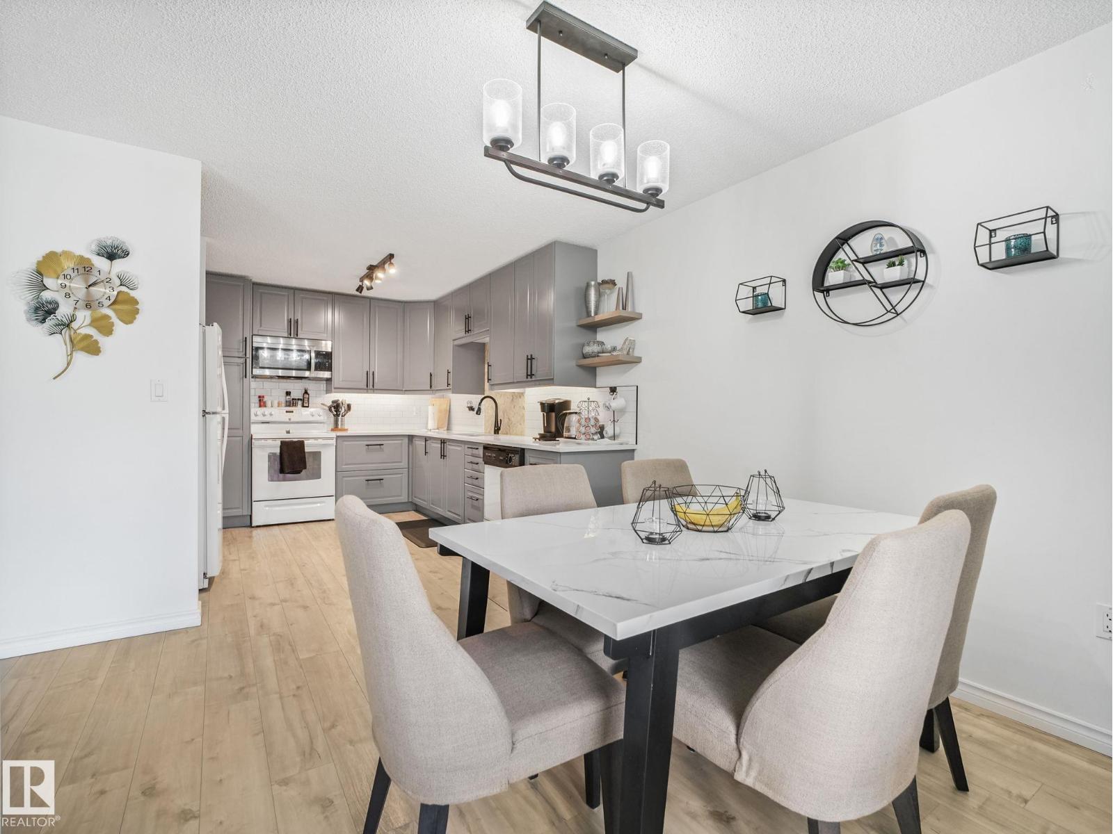 #212 15499 CASTLE DOWNS RD NW - 18