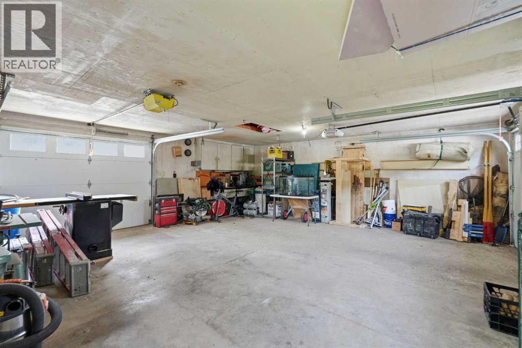 Large detached Garage with Alley Access and front access