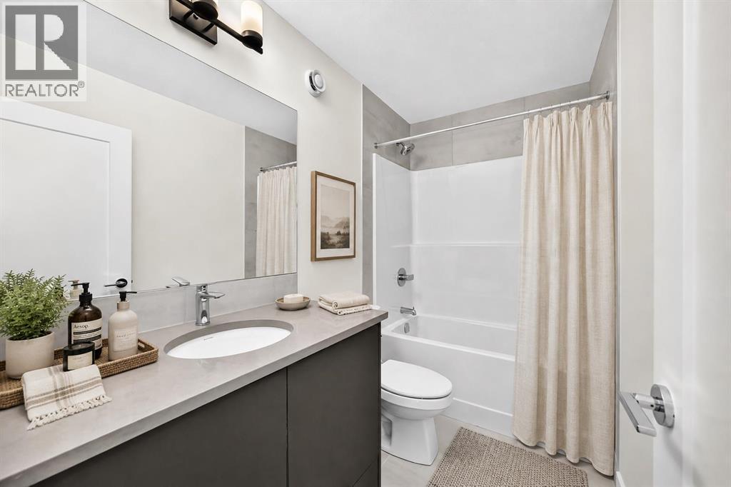 VIRTUALLY STAGED • Upper Floor Main Bath
