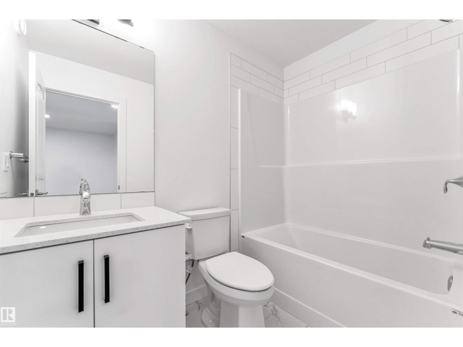 1208 14 AVE NW NW - 28
