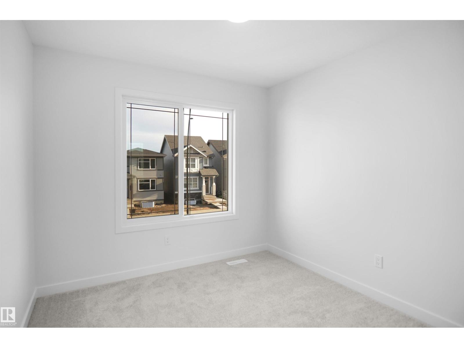 19486 21 AV NW - 23