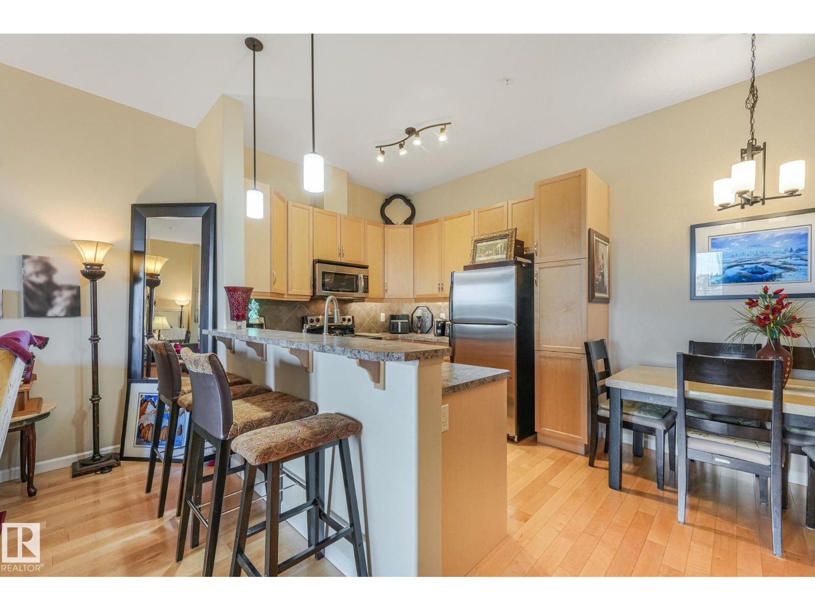 #403 6083 MAYNARD WY NW — photo 11