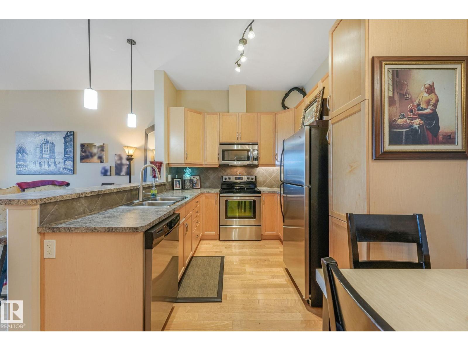 #403 6083 MAYNARD WY NW — photo 12