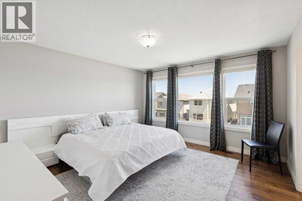 Primary bedroom easily handles a king bed