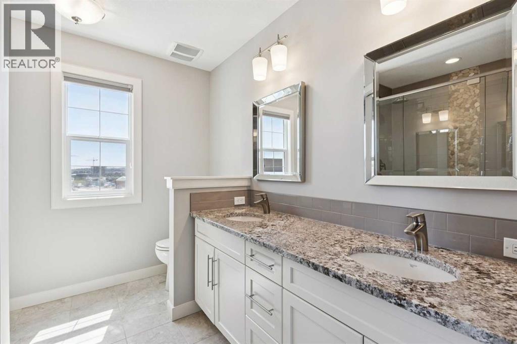 2 sinks and tons of countertop area in the ensuite