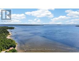 Plan 1060 Peek-a-boo Trail, Tiny, ON L9M0B3 Photo 12