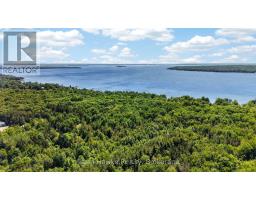 Plan 1060 Peek-a-boo Trail, Tiny, ON L9M0B3 Photo 8
