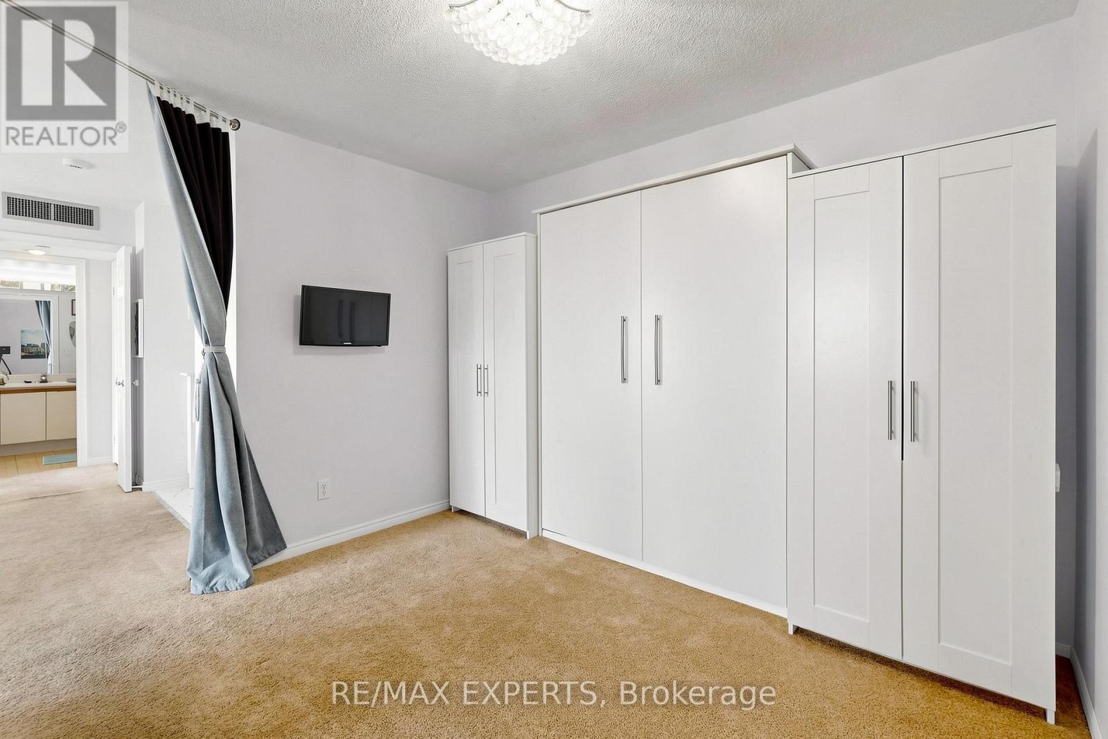 #909 1360 RATHBURN ROAD E - 18