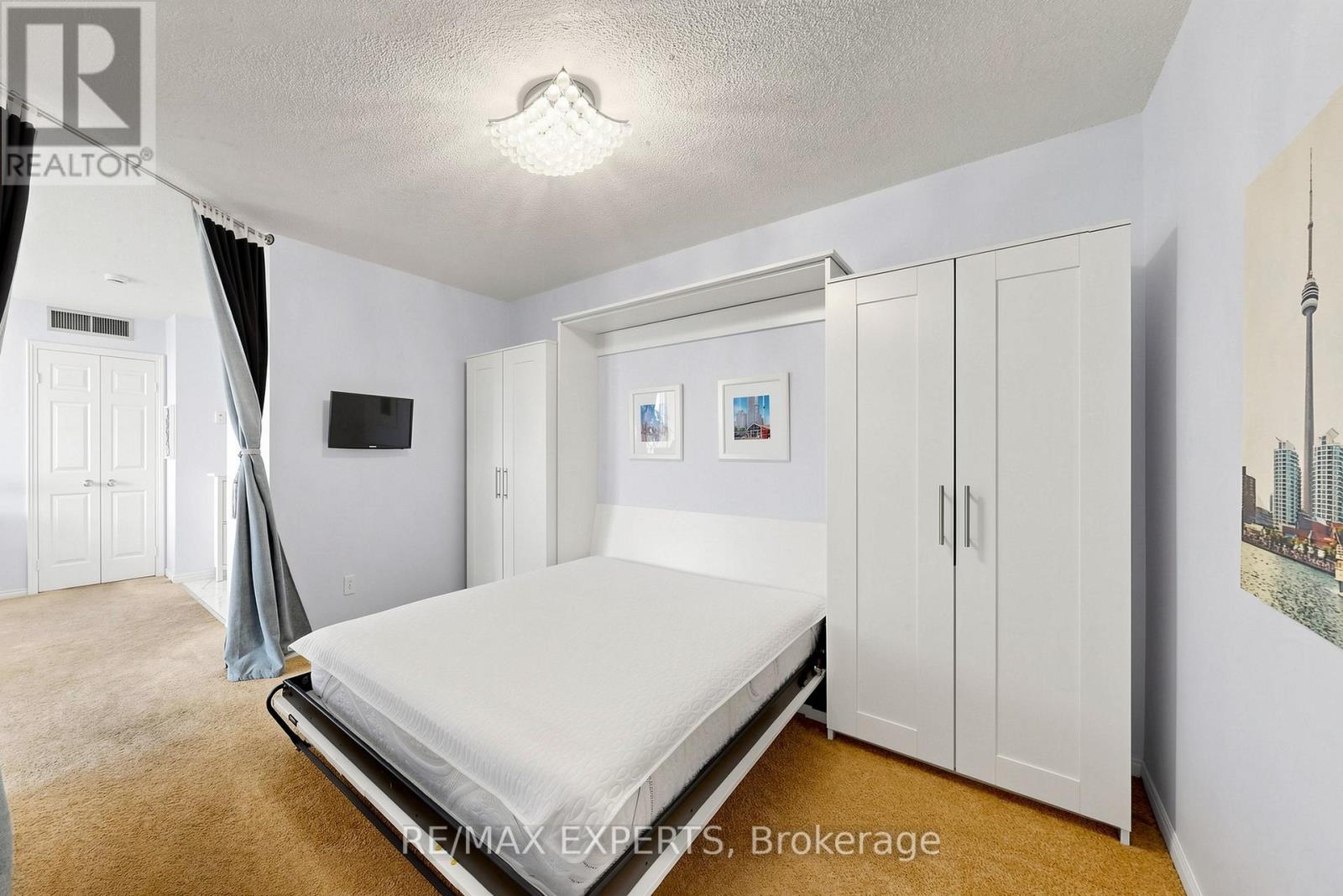 #909 1360 RATHBURN ROAD E - 21