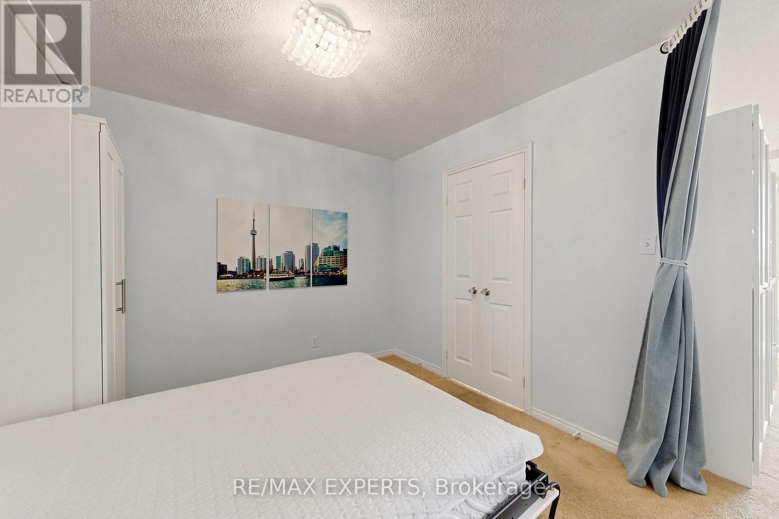 #909 1360 RATHBURN ROAD E - 22