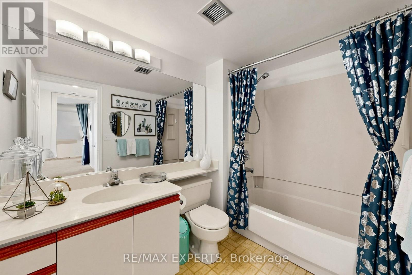 #909 1360 RATHBURN ROAD E - 28