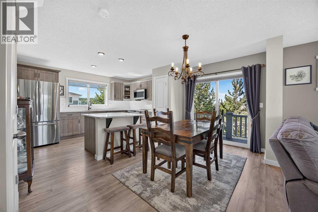 Dining area with sliding doors out to the side deck
