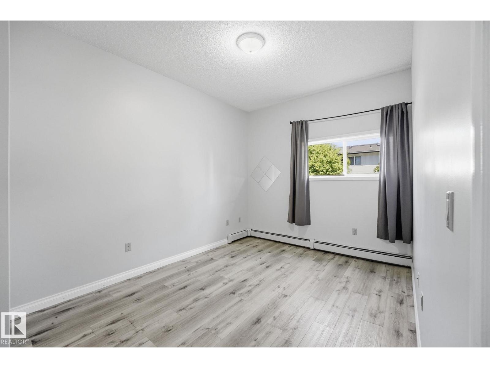 #105 11446 40 AV NW NW - 18