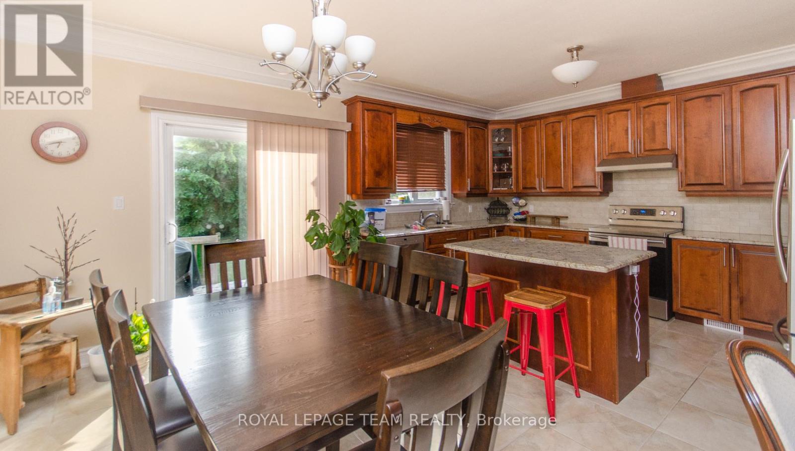 Kitchen & eating area with access to rear