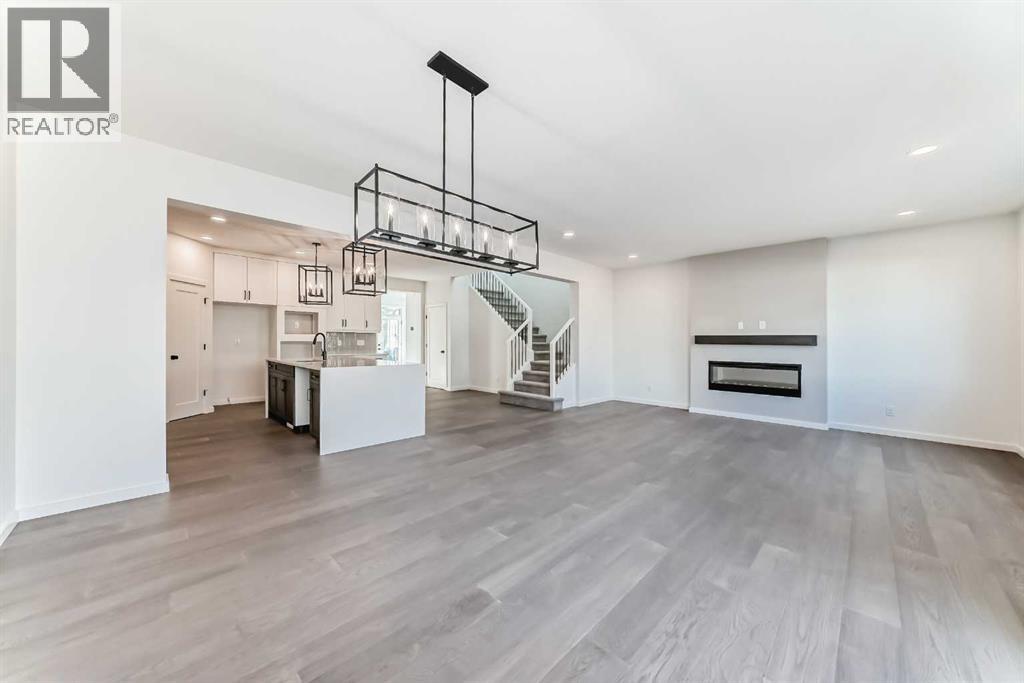 Dining Nook & Great Room • PLEASE NOTE: Photos are of a DIFFERENT Spec Home of the same model – fit and finish may differ. Interior selections and floorplans shown in photos