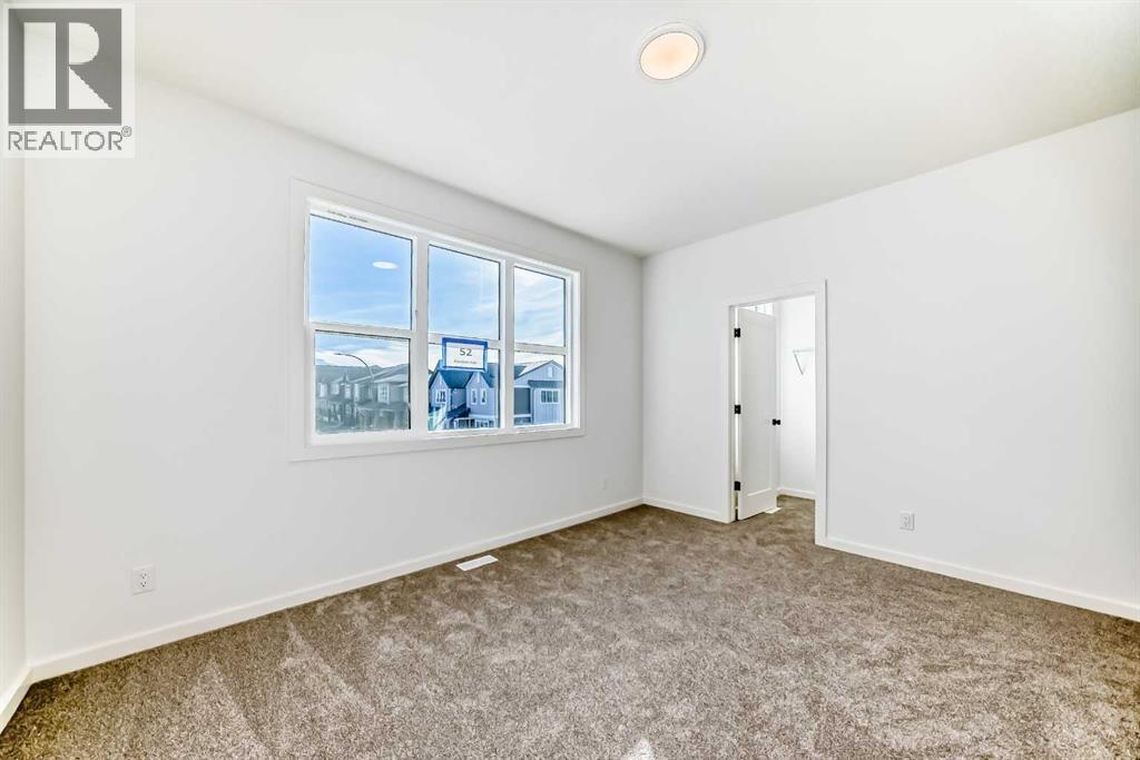 Bedroom Two • PLEASE NOTE: Photos are of a DIFFERENT Spec Home of the same model – fit and finish may differ. Interior selections and floorplans shown in photos