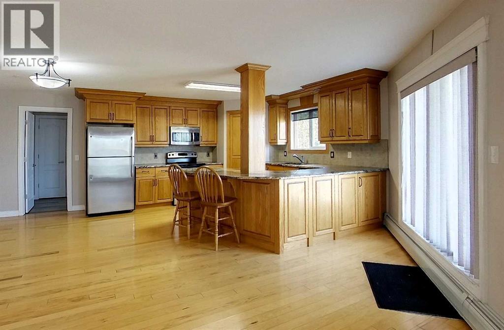 #302 5037 7 Avenue - 5