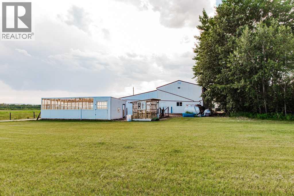TWO GREENHOUSES