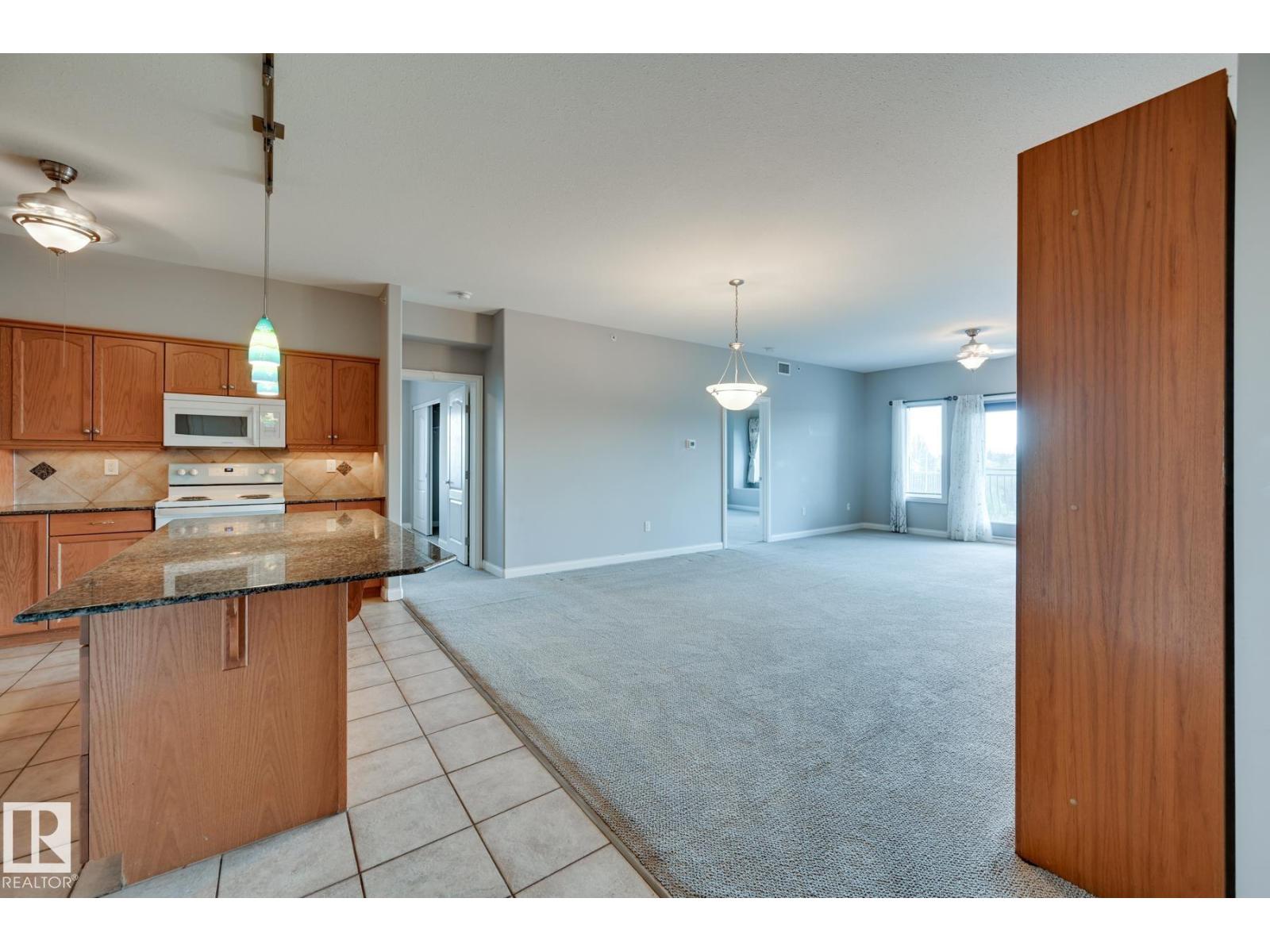 #416 1406 HODGSON WY NW - 15