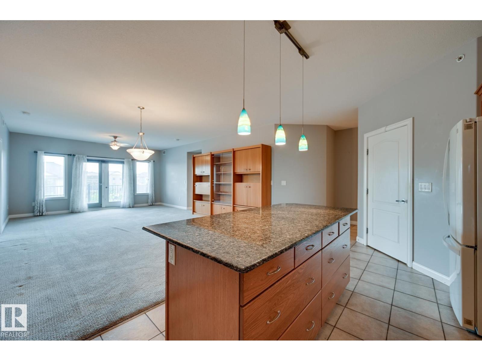 #416 1406 HODGSON WY NW - 16