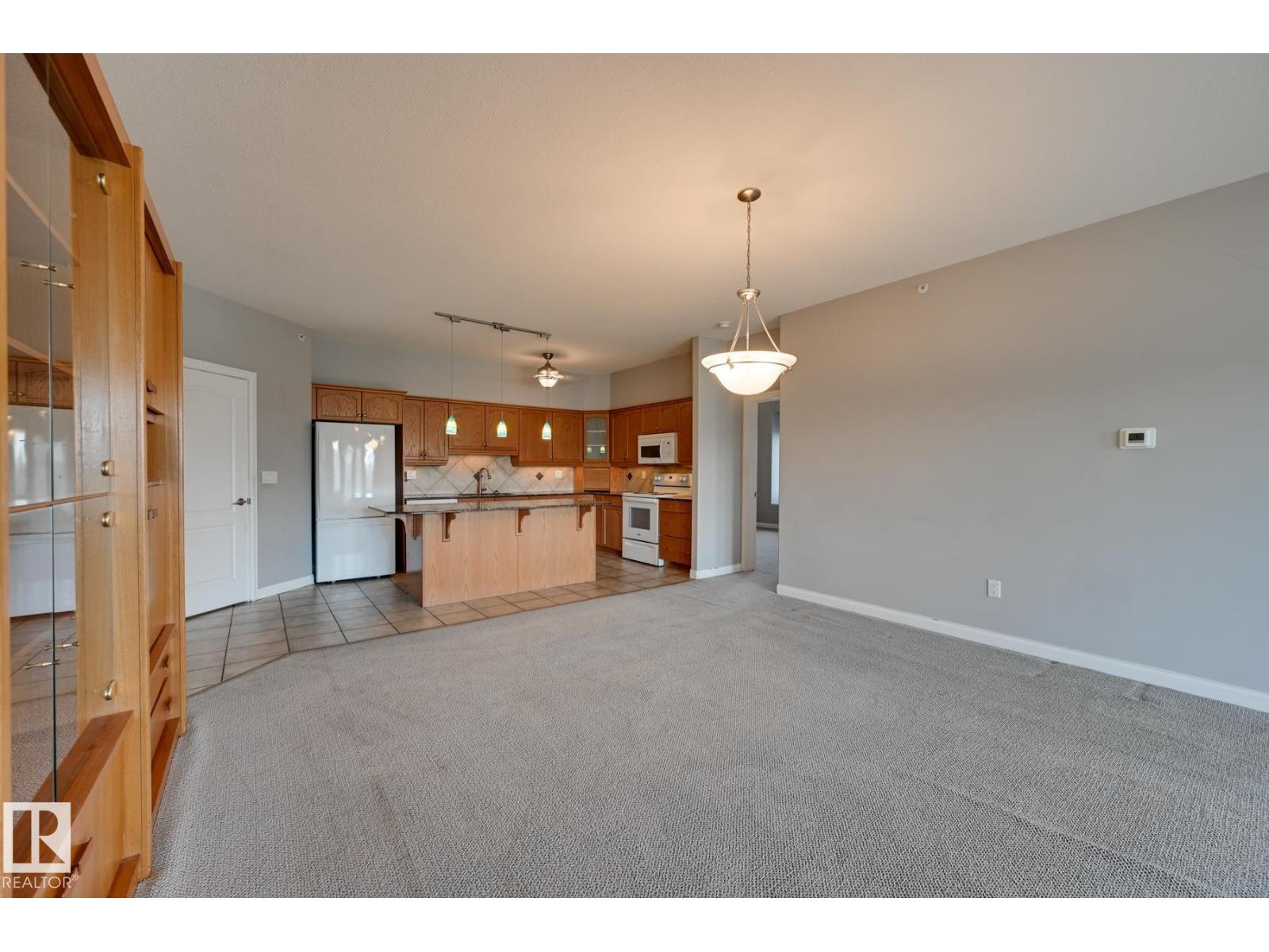 #416 1406 HODGSON WY NW - 17
