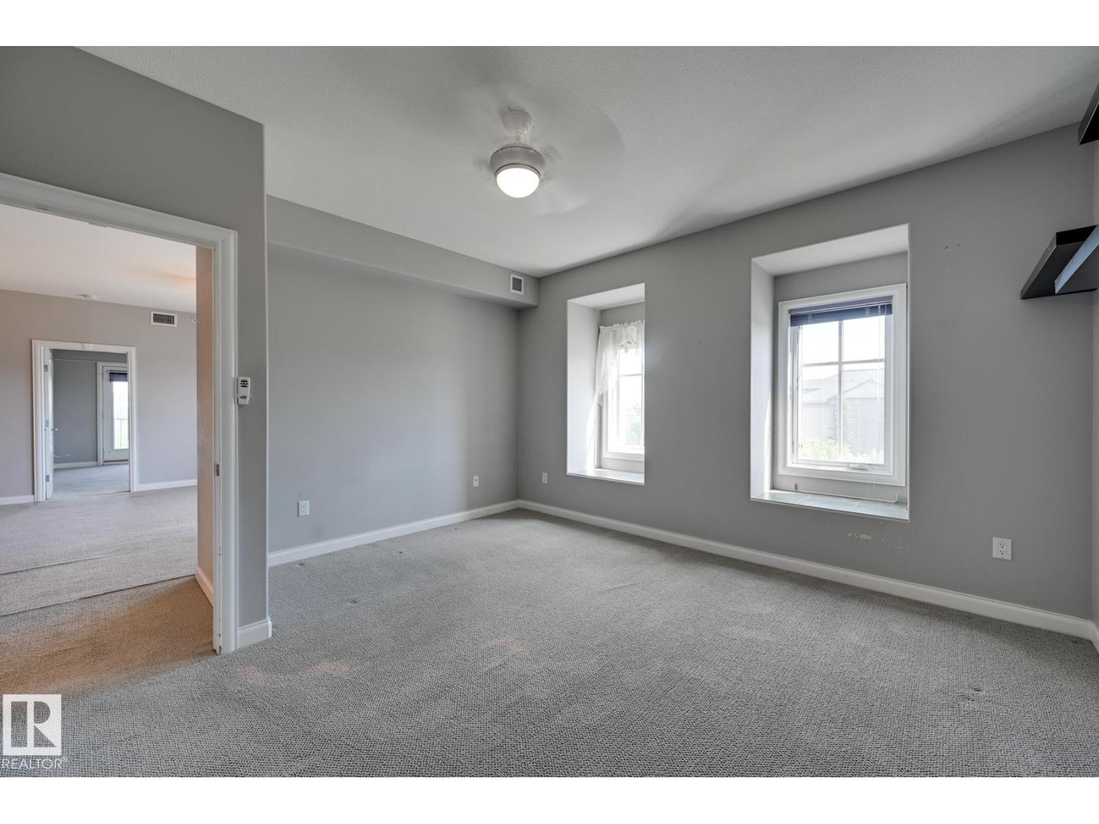 #416 1406 HODGSON WY NW - 23