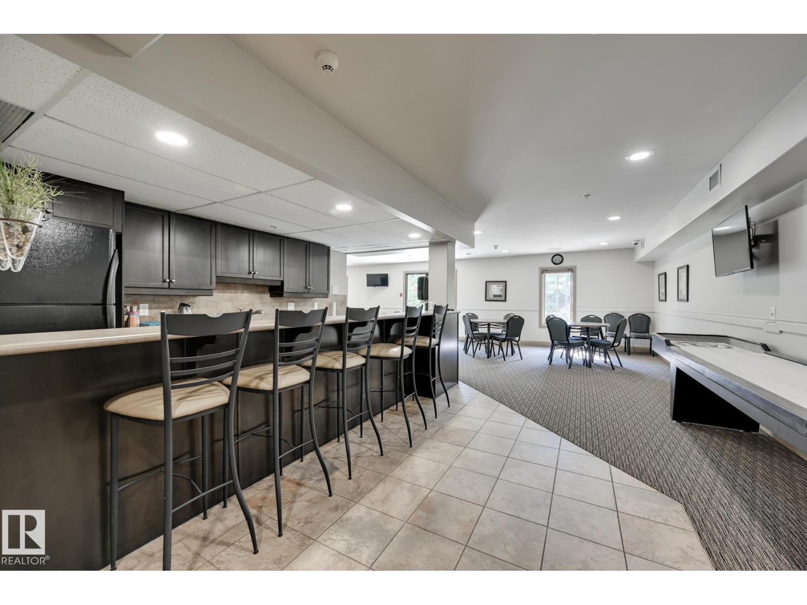 #416 1406 HODGSON WY NW - 42