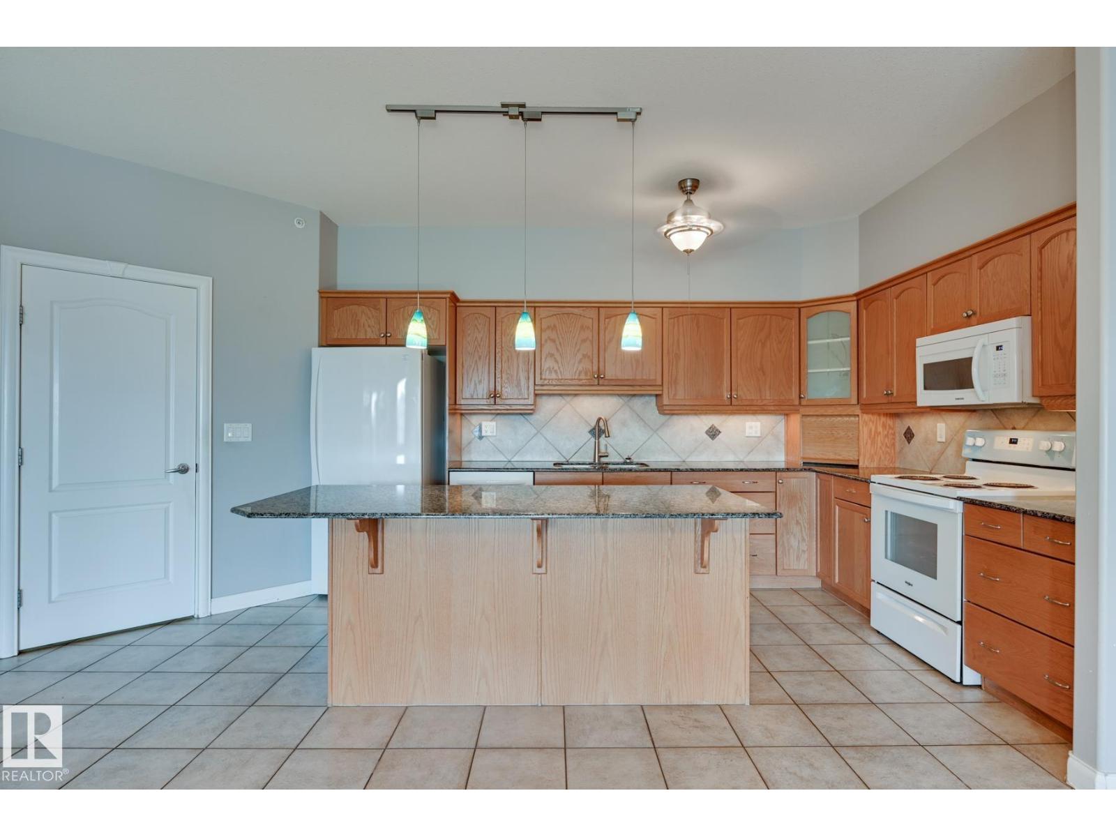 #416 1406 HODGSON WY NW - 8