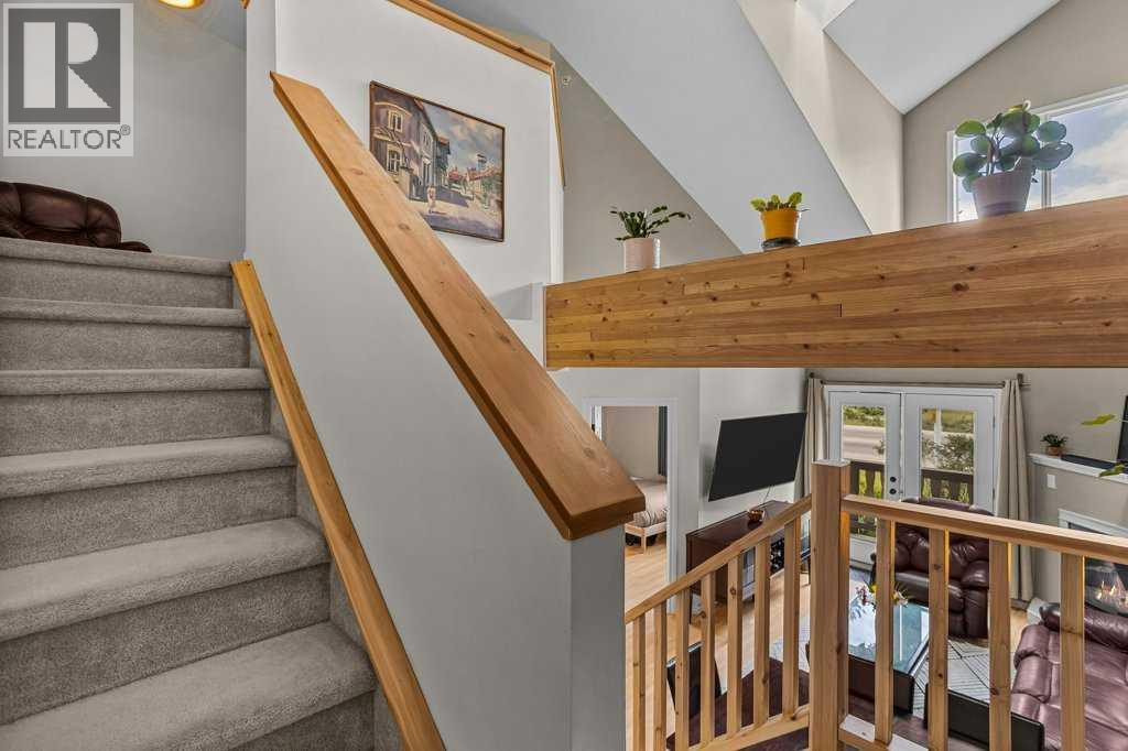 204, 512 Bow Valley Trail — photo 32