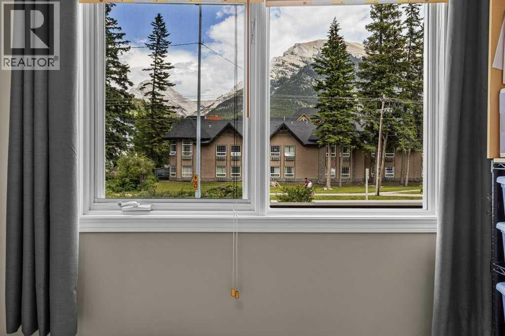 204, 512 Bow Valley Trail — photo 29