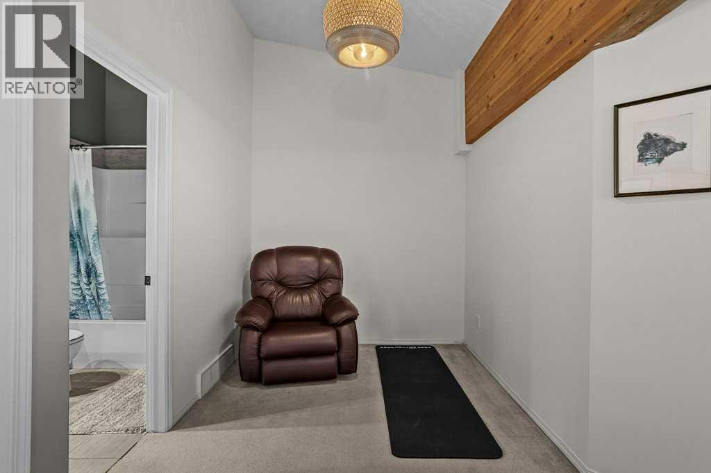 204, 512 Bow Valley Trail — photo 34
