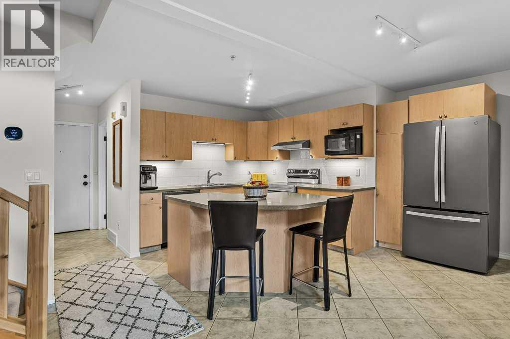 204, 512 Bow Valley Trail — photo 8