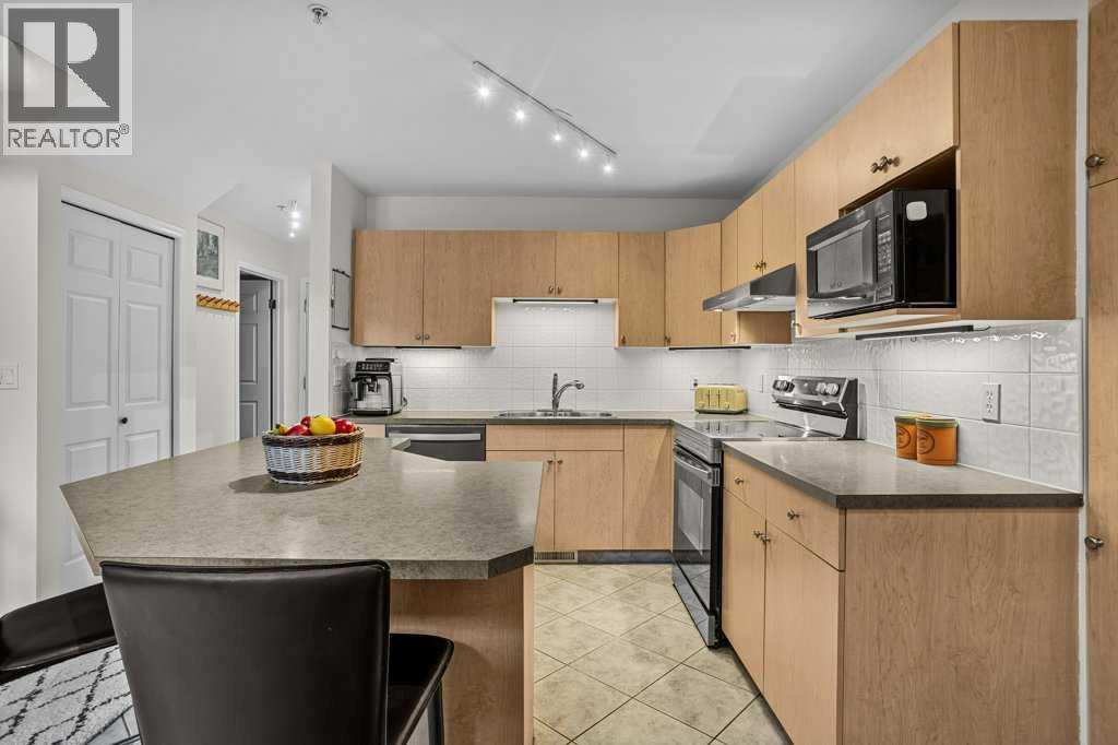 204, 512 Bow Valley Trail — photo 9