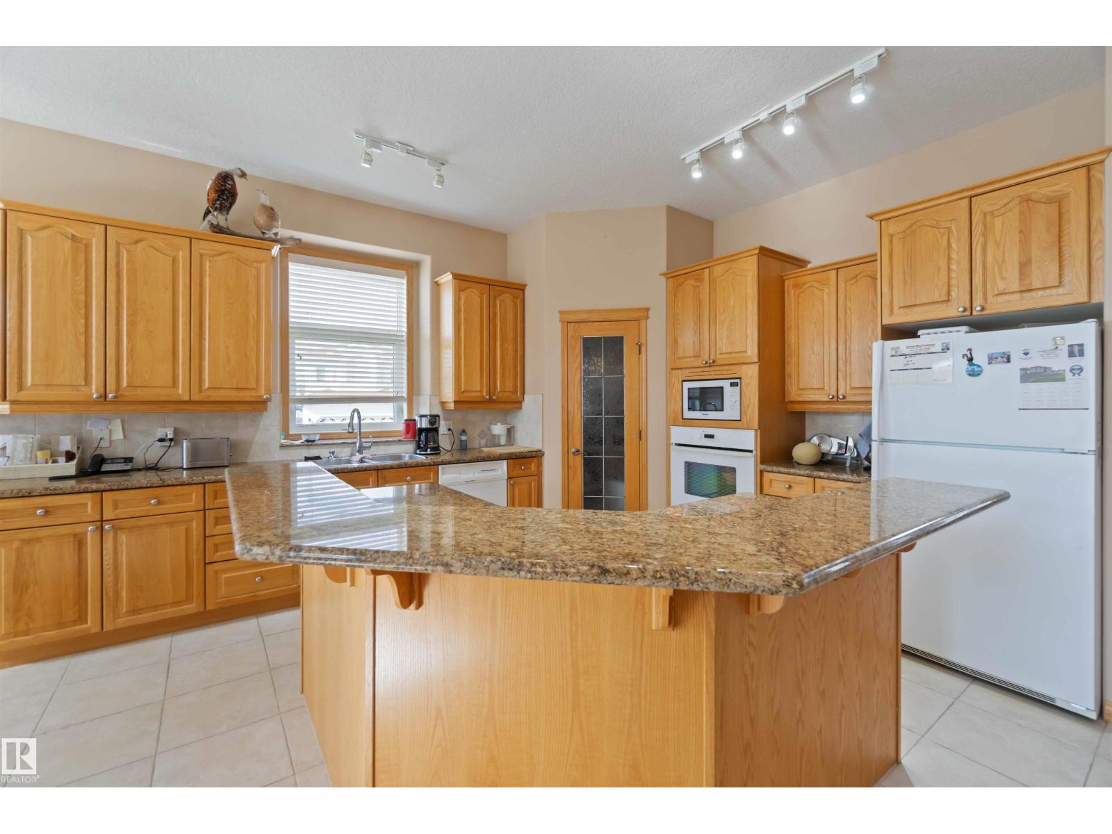 7542 165A AV NW — photo 23