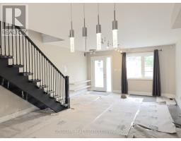 Living room - 817 Cosburn Avenue, Toronto, ON M4C2V9 Photo 6