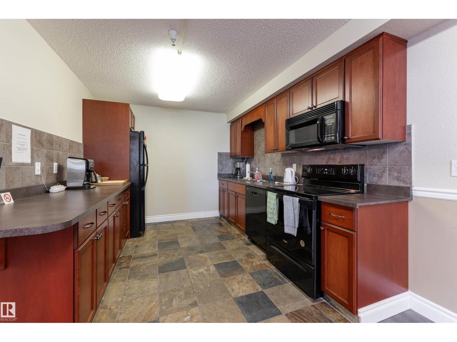 #404 12111 51 AV NW - 37