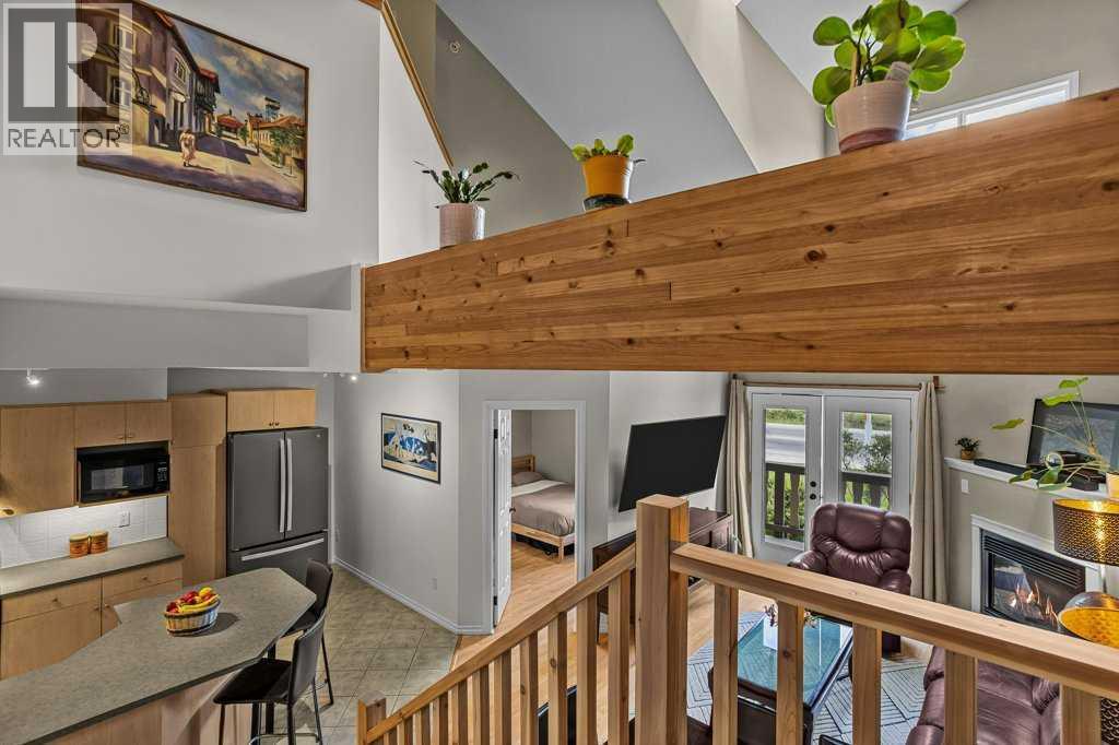 204, 512 Bow Valley Trail — photo 31