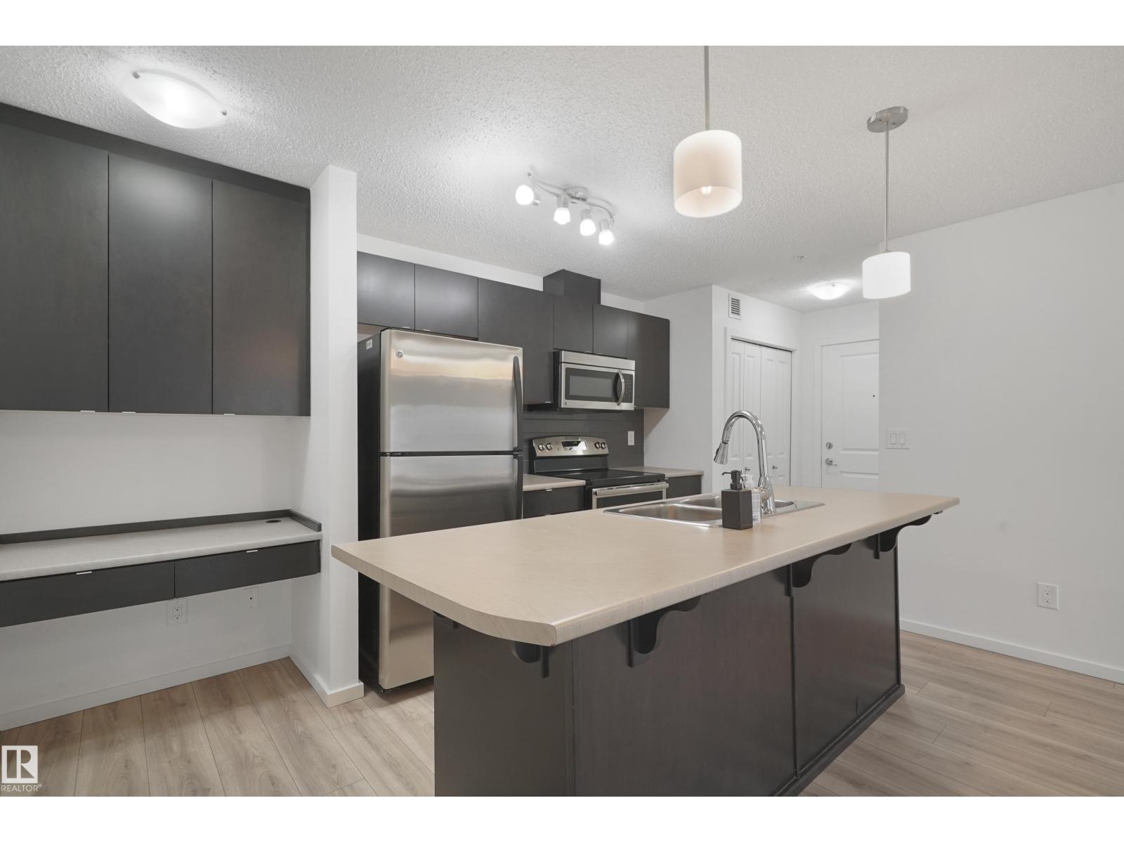 #114 3357 16A AV NW - 10