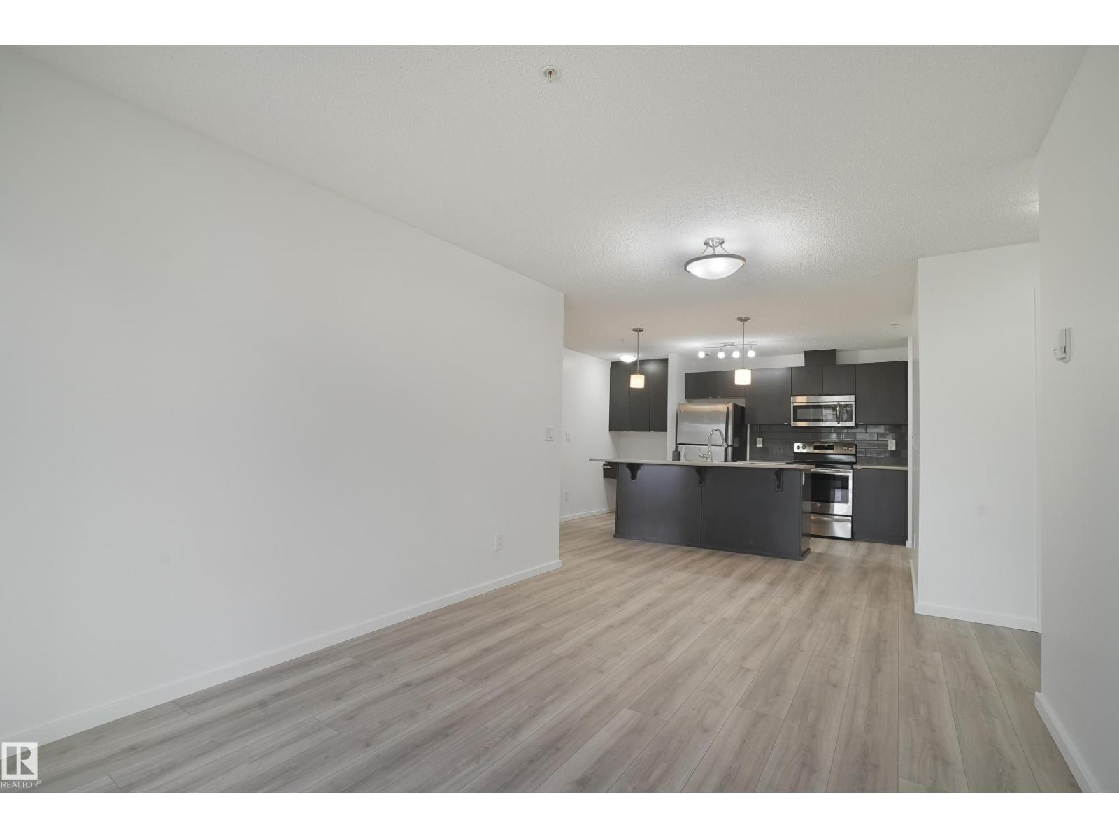 #114 3357 16A AV NW - 16